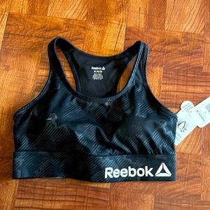 Reebok Women's essential Medium Impact Sports Bra w/removable cups,back pocket